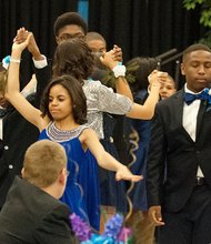 Shall we dance? // Richmond area youths danced elegantly and demonstrated their social graces at the 4th Annual Richmond Renaissance Junior Cotillion sponsored by the James River Chapter of Jack and Jill of America. “Honoring our Legends” was the theme of the gala event held Saturday, March 19, at the Claude G. Perkins Living and Learning Center at Virginia Union University. Twenty-six middle-schoolers ages 11 to 13 mastered several skills in programs leading up to the cotillion. The chapter is one of more than 200 affiliates of Jack and Jill of America, a community service group that focuses on developing youngsters into future leaders.
