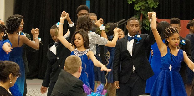 Shall we dance? // Richmond area youths danced elegantly and demonstrated their social graces at the 4th Annual Richmond Renaissance Junior Cotillion sponsored by the James River Chapter of Jack and Jill of America. “Honoring our Legends” was the theme of the gala event held Saturday, March 19, at the Claude G. Perkins Living and Learning Center at Virginia Union University. Twenty-six middle-schoolers ages 11 to 13 mastered several skills in programs leading up to the cotillion. The chapter is one of more than 200 affiliates of Jack and Jill of America, a community service group that focuses on developing youngsters into future leaders.
