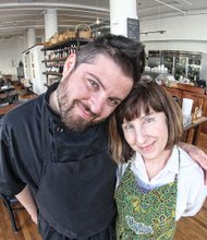 Patti B. Wright shares a moment with her son, Joshua M. “Josh” Wright, at the restaurant he owns and operates at 415 E. Grace St.  She moved back to the city after nearly three decades in Chesterfield County, joining the wave of people who are boosting the city’s population. As result of population growth in recent years, Richmond once again is on the list of the nation’s 100 largest cities.