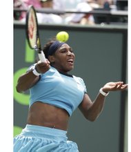 
Serena Williams hits a hard return in her losing effort against Svetlana Kuznetsova at Miami Open Monday. “I can’t win every match,” Serena said after the World No. 1 bowed to the long-shot No. 15 seed.
