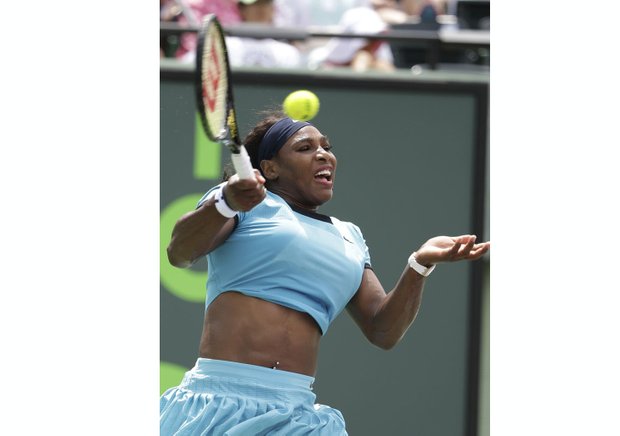 
Serena Williams hits a hard return in her losing effort against Svetlana Kuznetsova at Miami Open Monday. “I can’t win every match,” Serena said after the World No. 1 bowed to the long-shot No. 15 seed.
