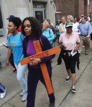 Michelle Turner of All Saints Episcopal Church made the cross she carried on the Good Friday Stations of the Cross community walk. 