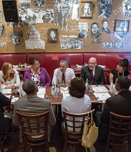 President Obama talks during an informal lunch last week at a Washington restaurant with top aides and four individuals who previously served time in prison, including Kemba Smith who grew up in Henrico County. 