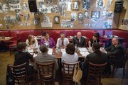 President Obama talks during an informal lunch last week at a Washington restaurant with top aides and four individuals who previously served time in prison, including Kemba Smith who grew up in Henrico County. 