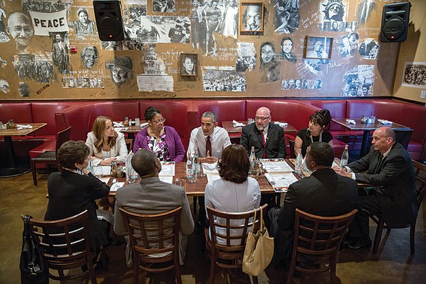 President Obama talks during an informal lunch last week at a Washington restaurant with top aides and four individuals who previously served time in prison, including Kemba Smith who grew up in Henrico County. 