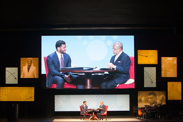 With a large screen illuminating their onstage presence Saturday, Seattle Seahawks quarterback Russell Wilson talks about growing up in Richmond with Harvard University professor Dr. Henry Louis “Skip” Gates Jr. at the Richmond Forum. 