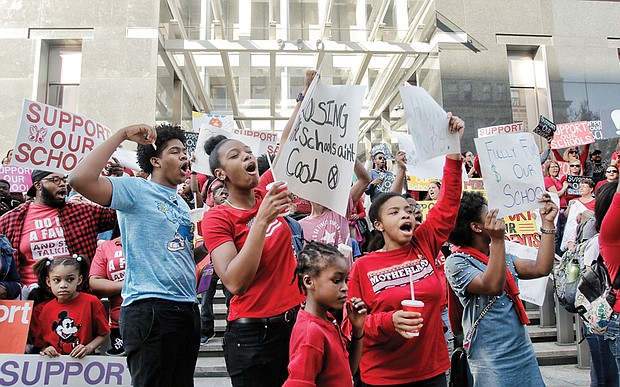 More than 500 people rally outside City Hall in support of Richmond schools funding.