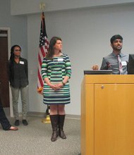 
Left to right, College of William & Mary students Jessica Lee and Caris Wright and team adviser Dr. Elizabeth Yost listen as Akshay Murthy pitches the Simply Connected Android-user interface.
