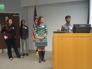 
Left to right, College of William & Mary students Jessica Lee and Caris Wright and team adviser Dr. Elizabeth Yost listen as Akshay Murthy pitches the Simply Connected Android-user interface.