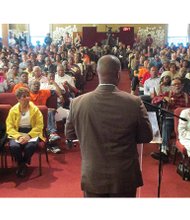 Richmond Public Schools Superintendent Dana T. Bedden addresses a rally last week packed with more than 500 people to save Armstrong High School and other schools from closure. Location: Mt. Olivet Church in the East End.