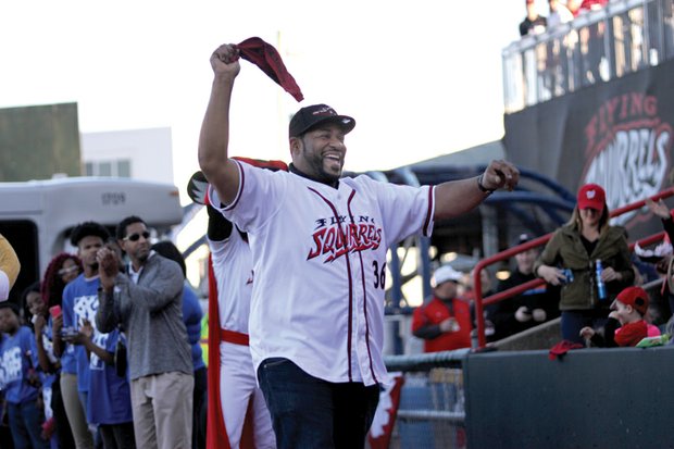 Go Squirrels! // Former Pittsburgh Steelers’ star running back Jerome “The Bus” Bettis waves a towel to stir up the crowd after throwing out the ceremonial first pitch Thursday night. 
