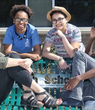 
Dr. Natalie May, left, holds an impromptu meeting with three Change the World RVA students. From left, they are Marshé Turner, Leo Reyes and Vincente Johnson. Location: Huguenot High School in South Side. 