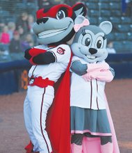 Go Squirrels! //
The Richmond Flying Squirrels and their entertainment guru, vice president and COO Todd “Parney” Parnell, provided lots of reasons to cheer for the thousands of fans who attended the minor league baseball team’s official home opening games last Thursday and Friday against the Altoona Curve at The Diamond. The team’s newest mascot, Nutasha, right, cozies up to longtime mascot Nutzy.