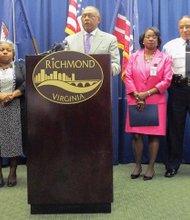 Mayor Dwight C. Jones speaks at a news conference last Friday at City Hall backed by, left to right, Budget Director Jay Brown, Deputy Chief Administrative Officer Lenora Reid, Chief Administrative Officer Selena Cuffee-Glenn, Police Chief Alfred Durham and Fire and Emergency Services Chief Robert Creecy.