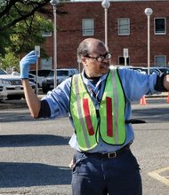 U.S. Postal Service employee Louis Hatcher directs traffic at the Main Post Office on Brook Road as last-minute filers arrive Monday to drop off their federal income tax documents before the deadline. The goal: To have their letters and envelopes postmarked April 18 to avoid penalties for late filing. The deadline is usually April 15, but it was extended this year because of Washington’s annual D.C. Emancipation Day holiday commemorating President Abraham Lincoln’s signing of a law on April 16, 1862, abolishing slavery in the nation’s capital. Although the holiday is recognized only in the District of Columbia, the IRS recognizes the day as a legal holiday and extends tax filing until the next business day when it falls on a Friday or during a weekend.