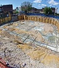 

The foundation is being laid for the $6.3 million Eggleston Plaza at 2nd and Leigh streets in Jackson Ward, as captured Tuesday by a fisheye lens.
When complete, the development is to include 31 apartments and a first-floor restaurant on the former site of the historic Eggleston Hotel. During the era of segregation, the hotel served renowned civil rights leaders, famous entertainers and other African-Americans who were barred from other Richmond hotels because of the color of their skin. The building collapsed and the site was cleared in 2009. 
The Eggleston family teamed up with developer Kelvin Hanson on the new project, according to city documents. MGT Construction is doing the work.
The project is across 2nd Street from the Hippodrome Theater and Taylor Mansion entertainment, restaurant and residential complex. The planned development also includes 10 housing units going up nearby at 1st and Jackson streets.