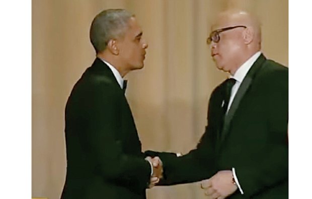 President Obama greets comedian Larry Wilmore after the “Comedy Central” host ended last Saturday’s White House Correspondents’ Association Dinner with remarks that later drew criticism.