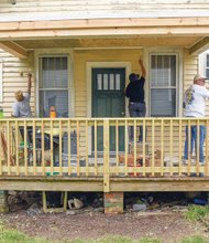 Above, Spirited volunteers make repairs to a home on Ruffin Road during Rebuilding Together Richmond,  the local volunteer effort during National Rebuilding Day. 
Nearly 1,000 people turned out last Saturday to help low-income senior homeowners along the South Side corridor of Jefferson Davis Highway.