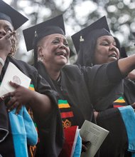 Theology school graduates, from left, Donna Cosby, Sheila Dent, Rona Evans and Alice Freeman shed tears of joy as the VUU choir sings.