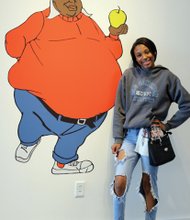 Hope Bibbs posed with “Fat Albert” in the “Funky Turns 40” exhibition.