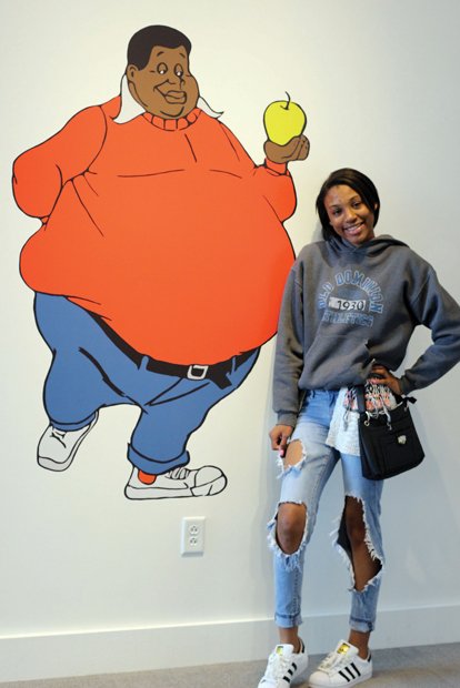 Hope Bibbs posed with “Fat Albert” in the “Funky Turns 40” exhibition.