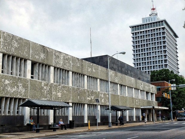 The worn exterior of the City of Richmond’s former Public Safety Building is a prime example of the city’s failure to invest in maintenance. The city now faces a huge bill to cover costs for improving public buildings, streets and other infrastructure, as well as for modernizing schools. 