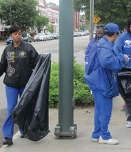 Members of the National Pan-Hellenic Council of Metro Richmond — a coalition of the nine historically African-American fraternities and sororities — pick up litter in Jackson Ward on a recent weekend. Similar community spring-cleaning efforts have been taking place across the area. Last weekend, for example, volunteers cleaned up alleys in Barton Heights, while others spent time clearing growth from four African-American burial grounds located on the border between Richmond and Henrico County.