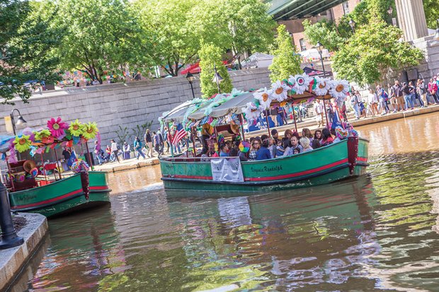 ¿Que Pasa? Richmond //
A colorful canal boat provides free rides to participants at the ¿Que Pasa? Festival, which translates to “what’s happening.” Organizers of the festival last weekend in Downtown used decorations to transform the Canal Walk into a semblance of the Floating Gardens of Xochimilco in Mexico City. The event featured music, dance, food, drink and arts and crafts celebrating Latin American culture.