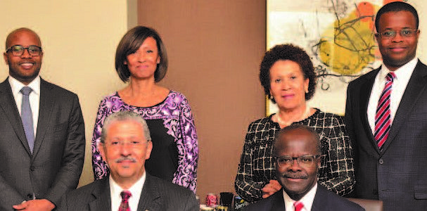 From L-R Top Row: Chiefy Papa Wassa Nduom, Monica Thomas, Yvonne Nduom and Nana Kweku Nduom. Bottom Row: Outgoing CEO Norman Williams and Dr. Papa Kwesi Nduom Lead poising Dr. Deneen Woodard addresses the community on the dangers of and sources of lead. Photo Credit: Access Community Health Network.
