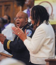 Richmond Police Capt. Marty Harrison and his wife, Sharon, attend the Officer Appreciation Day Service at Fourth Baptist Church in the East End, where Chief Alfred Durham gave remarks last Sunday. The service honored Richmond officers who have been killed in the line of duty and celebrated those currently serving.