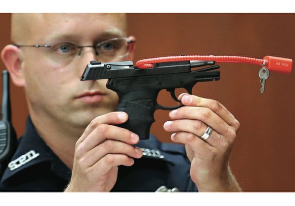Online bidding for the gun used by George Zimmerman to kill unarmed black teenager Trayvon Martin in Sanford, Fla., in ...