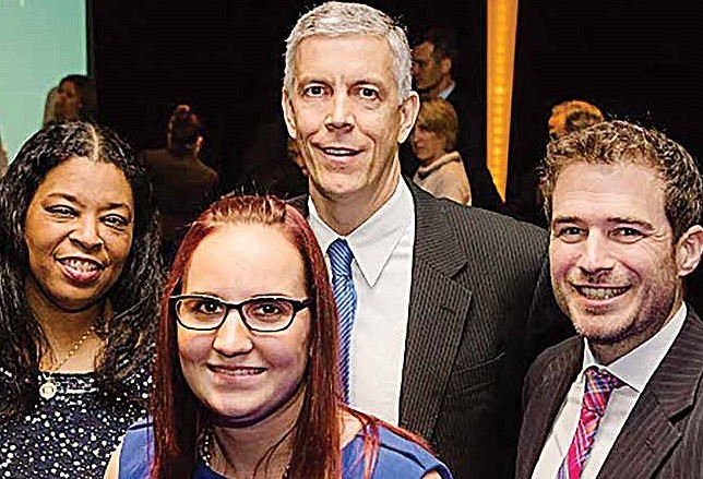  Dr. Jacqueline Samuel (left) is joined by the rest of the National Louis University 2016 Reach Award winners including (from left) Amanda Leftwich, Arne Duncan and Matthew King, at a gala celebration at the Hotel Sofitel in Chicago.