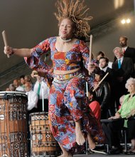 Imani Bell of the Elegba Folklore Society gives a highenergy performance of African dance. The event also served as a Friday showcase for ART 180’s spring exhibit of Richmond youth art.