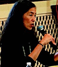 Dr. Julie Morita fields questions from Englewood residents on how to create a healthier Englewood. Photo By: Matt Smith, Director of Communications for DFFS