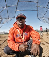 Lawrence Day, coach of the Armstrong High School baseball team, shows off the renovated diamond at the East End school.