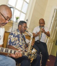 MetroPosse members, James Edmonds, Neal Bowens, Del Rogers and Percy Minor perform during the Jazz on the Lawn celebration honoring Dr. Cooper.