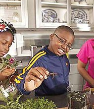 Using everyday items, eight different science activities keep kids engaged this summer. Photo by: J.B. Spector/Museum of Science and Industry, Chicago.