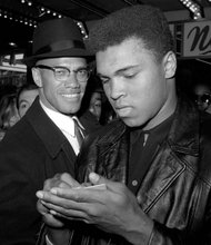 Malcolm X and newly crowned heavyweight champion Muhammad Ali are together in New York City in March 1964.   