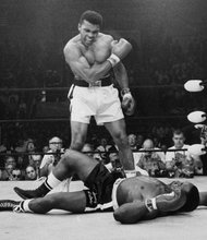 Muhammad Ali taunts Sonny Liston after knocking him out in the first round of their May 1965 rematch, three months after Mr. Ali first defeated Mr. Liston to win the heavyweight title. 