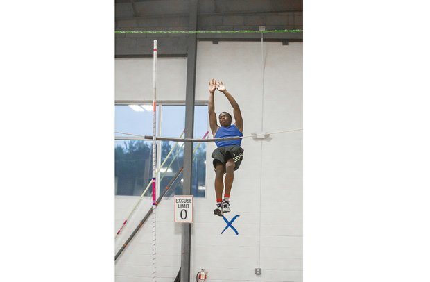 Pole vaulter Chris St. Helen practices his lift and positions at Aerial East Gymnastics in Mechanicsville. The Henrico resident won the Division 5, South Regional title last month by clearing 15-4.
