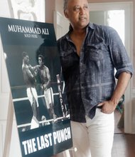 Petersburg resident Jesse Vaughan displays poster art from “The Last Punch,” the feature film he directed about Muhammad Ali’s final fight.
