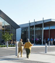 New high-tech Varina library // A bevy of officials cut the ribbon Wednesday, June 1, officially opening Henrico County’s newest public library. The Varina Area Library, located at 1875 New Market Road just south of Pocahontas Parkway, has a digital media lab with 3-D printers, an area for teens, collaborative group spaces and computers for public among its many amenities. The state-of-the-art library, approved by Henrico voters in a 2005 bond referendum, replaces the old library building in Varina that closed in May.
