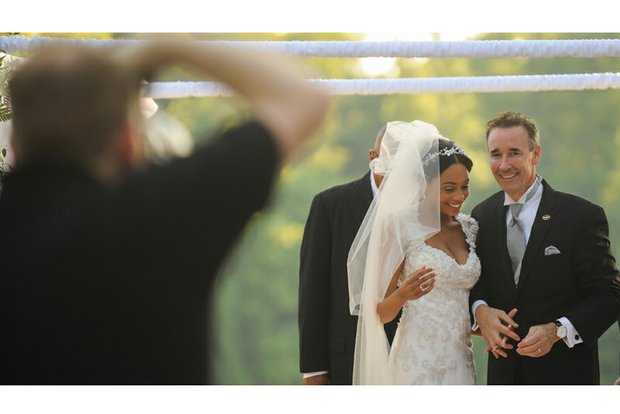 After the “I do’s,” Joseph D. “Joe” Morrissey and Myrna Warren turn to walk down the aisle last Saturday as husband and wife to the applause of 250 guests. 