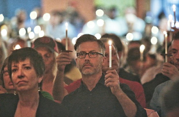 Gov. Terry McAuliffe and several elected officials were among the crowd of nearly 1,000 people who gathered Tuesday night at Diversity Richmond in North Side to show their support for the people of Orlando.