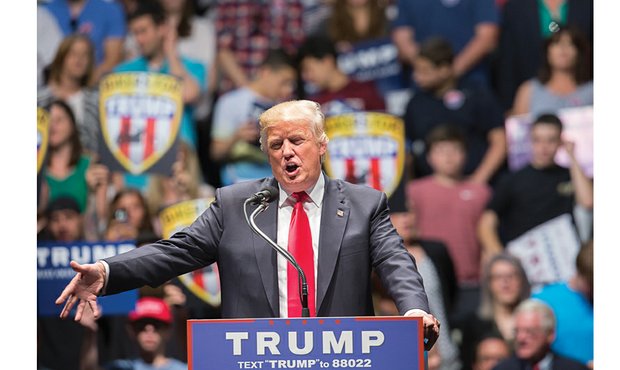 Donald J. Trump, the presumptive Republican Party nominee for president, addresses a half-full Richmond Coliseum crowd last Friday during a campaign swing through the battleground state.