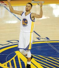Below, Stephen Curry of the Golden State Warriors reacts when play stops in the second half of the title game against Cleveland. The Warriors played Game 7 on their home turf, the Oracle Arena in Oakland, Calif.
