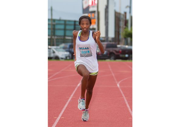 Britton Wilson draws applause in more ways than one. The 15-year-old sparkles with her fast feet on the running track ...