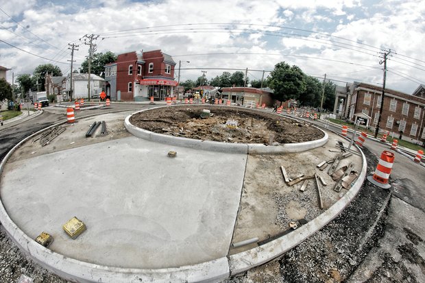 Cityscape // A new traffic circle is taking shape at the Six Points intersection in Highland Park in North Side. The $1.2 million project to improve traffic control has been underway since early January. When complete, it will be one of the biggest roundabouts in the city. It will serve motorists heading east and west on Brookland Park Boulevard, and north and south on Meadowbridge Road. The other streets that meet at this central point are Dill Avenue, which runs northeast, and 2nd Avenue, which is south of the intersection. Pedestrian crosswalks, handicap ramps and landscaping also are to be installed. Traffic lights that have long controlled the flow of cars and trucks have been removed from the intersection. City officials believe the new traffic circle could help eliminate crashes. Traffic accidents at the intersection were rare, however, with only five in the previous three years. Weather delays from snow and heavy rain have delayed the project’s completion. The city is using federal and state funds and its own contribution to cover the project’s cost. 