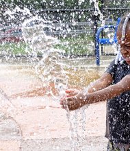 Waterworks //
Promise Clarke, 3, enjoys the crisp spray of water on a hot and humid Wednesday at the Fairmount Pool on U Street in Richmond’s East End. City pools, the James River and other recreation spots are likely to see lots of visitors during the weekend as temperatures are to soar to nearly 100 degrees for the next few days.