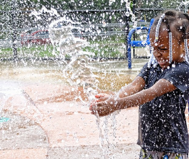 Waterworks //
Promise Clarke, 3, enjoys the crisp spray of water on a hot and humid Wednesday at the Fairmount Pool on U Street in Richmond’s East End. City pools, the James River and other recreation spots are likely to see lots of visitors during the weekend as temperatures are to soar to nearly 100 degrees for the next few days.